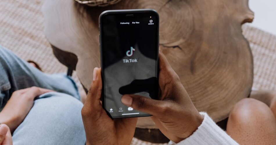 person holding black android smartphone