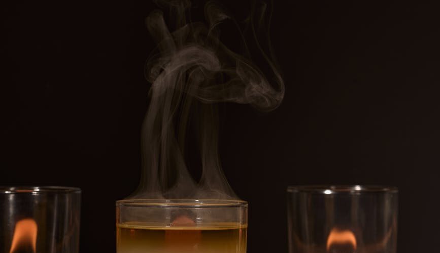 burning candles with smoke for aromatherapy