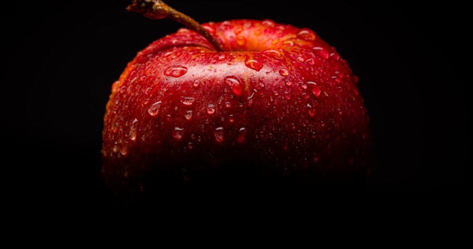 red apple fruit with black background