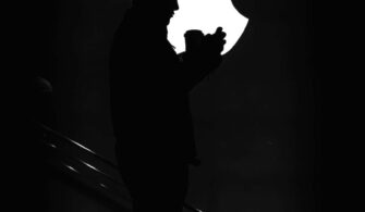silhouette of man on stairs